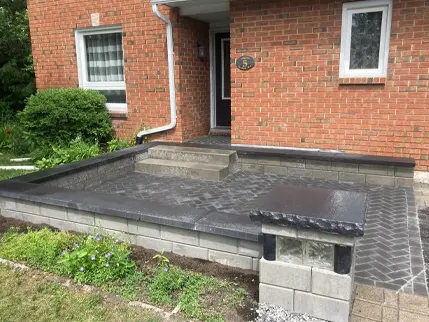 Custom outdoor fire pit installation in an Ottawa backyard.